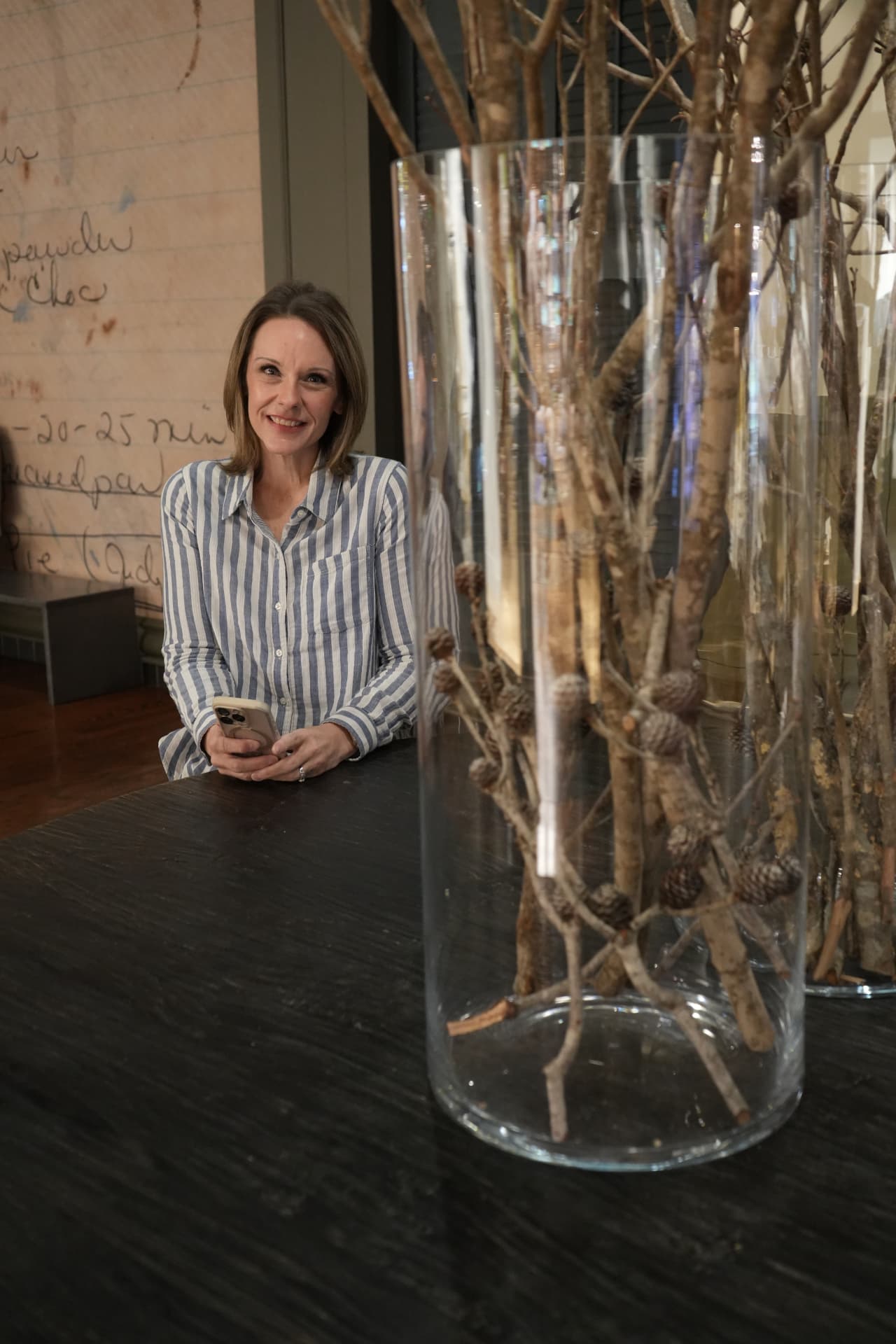 LaCrisha Lorenzoni in conversation at a table